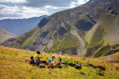 Cyclists in the Caucasus Mountains of Georgia