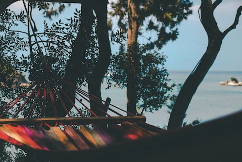 Colourful hammock with ocean view