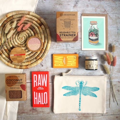 An assortment of eco-friendly products including a reusable tea strainer