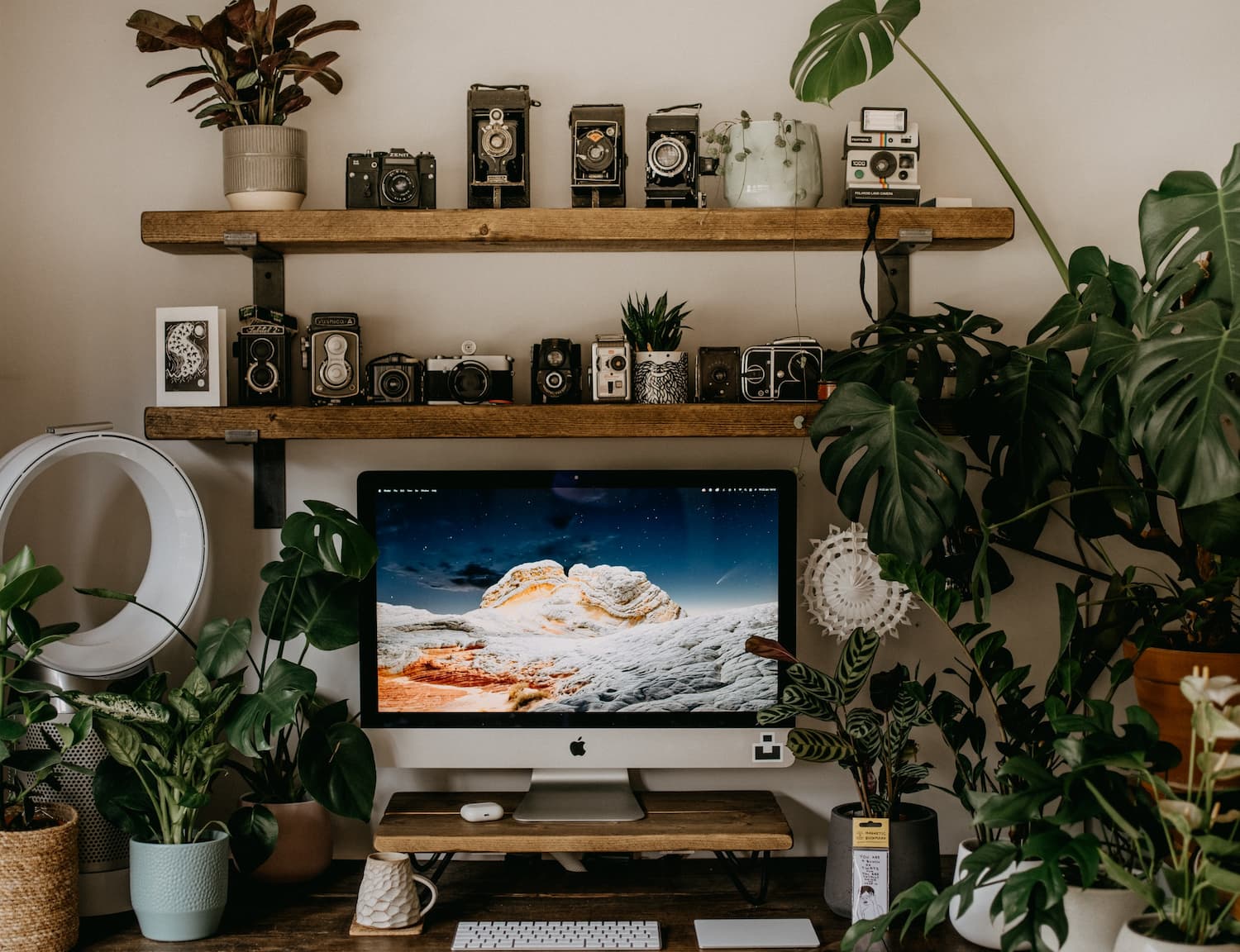 Desk with iMac, Dyson Purifier and assorted tech