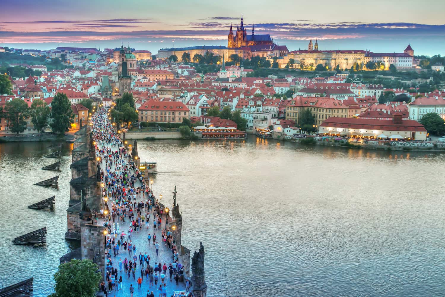A landscape view of the river and Charles Bridge in Prague