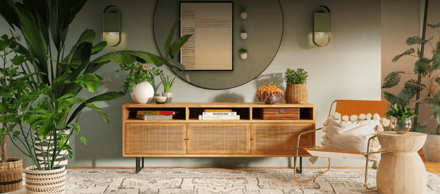 stylish living room with large circular mirror and several plants